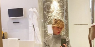 Alessia Marcuzzi si riscalda: scatta il gossip con la flashdance in bagno!