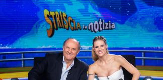 Michelle Hunziker e Gerry Scotti dietro al bancone di Striscia la notizia striscia la notizia conduttori Michelle Hunziker e Gerry Scotti notizie ultima ora